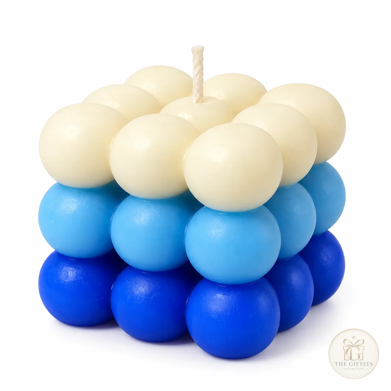 Bubble candle in white and blue, made of stacked wax spheres